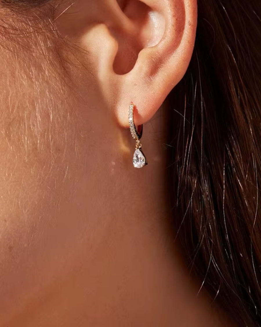 CRYSTAL HUGGIE PEAR-CUT DROP EARRINGS 18K GOLD PVD - STUDIO JO STORE  