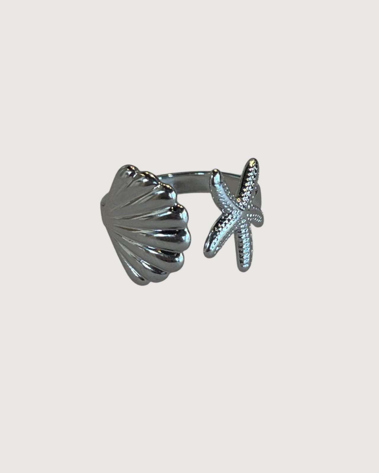 COASTAL CHARM SHELL AND STARFISH OPEN RING SILVER - STUDIO JO STORE  