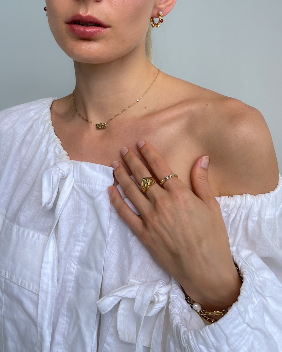 LUMIÈRE SQUARE CUT CRYSTAL BAND RING 18K GOLD - STUDIO JO STORE  