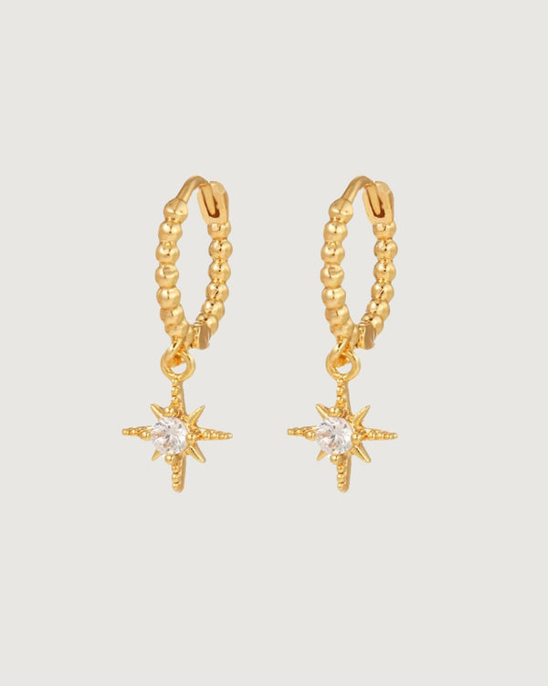STAR DROP HUGGIE HOOP EARRINGS 18K GOLD - STUDIO JO STORE  