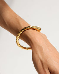 Thumbnail for Gold textured cuff bracelet by TEGAN RAE JEWELLERY featuring a stylish, wide design with a textured finish.