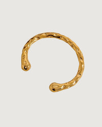 Thumbnail for Gold textured cuff bracelet by Tegan Rae Jewelry featuring a sleek, modern design with a bold, metallic finish.