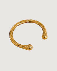 Thumbnail for Gold textured cuff bracelet by TEGAN RAE JEWELLERY featuring a sleek, modern design and intricate surface detailing.