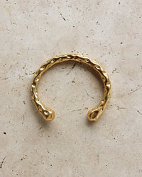 Thumbnail for Gold textured cuff bracelet by Tegan Rae Jewelry featuring a stylish, wide metal design with a textured finish.
