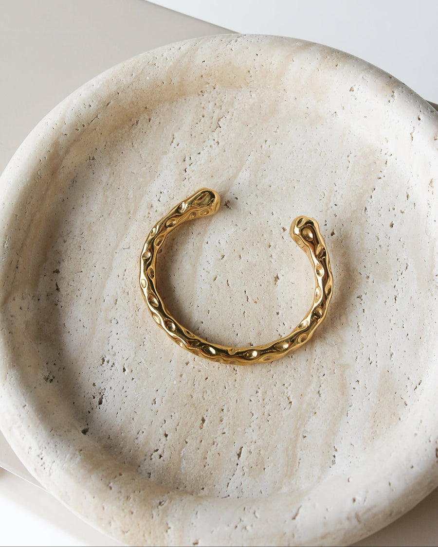 Gold textured cuff bracelet by TEGAN RAE JEWELLERY with a stylish, bold design and intricate surface details.