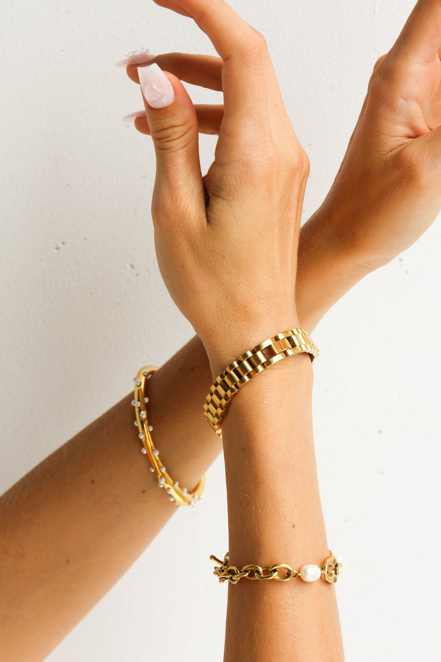 Gold watch link chain bracelet by Tegan Rae Jewellery, featuring a sleek, interconnected chain design for elegant wear.