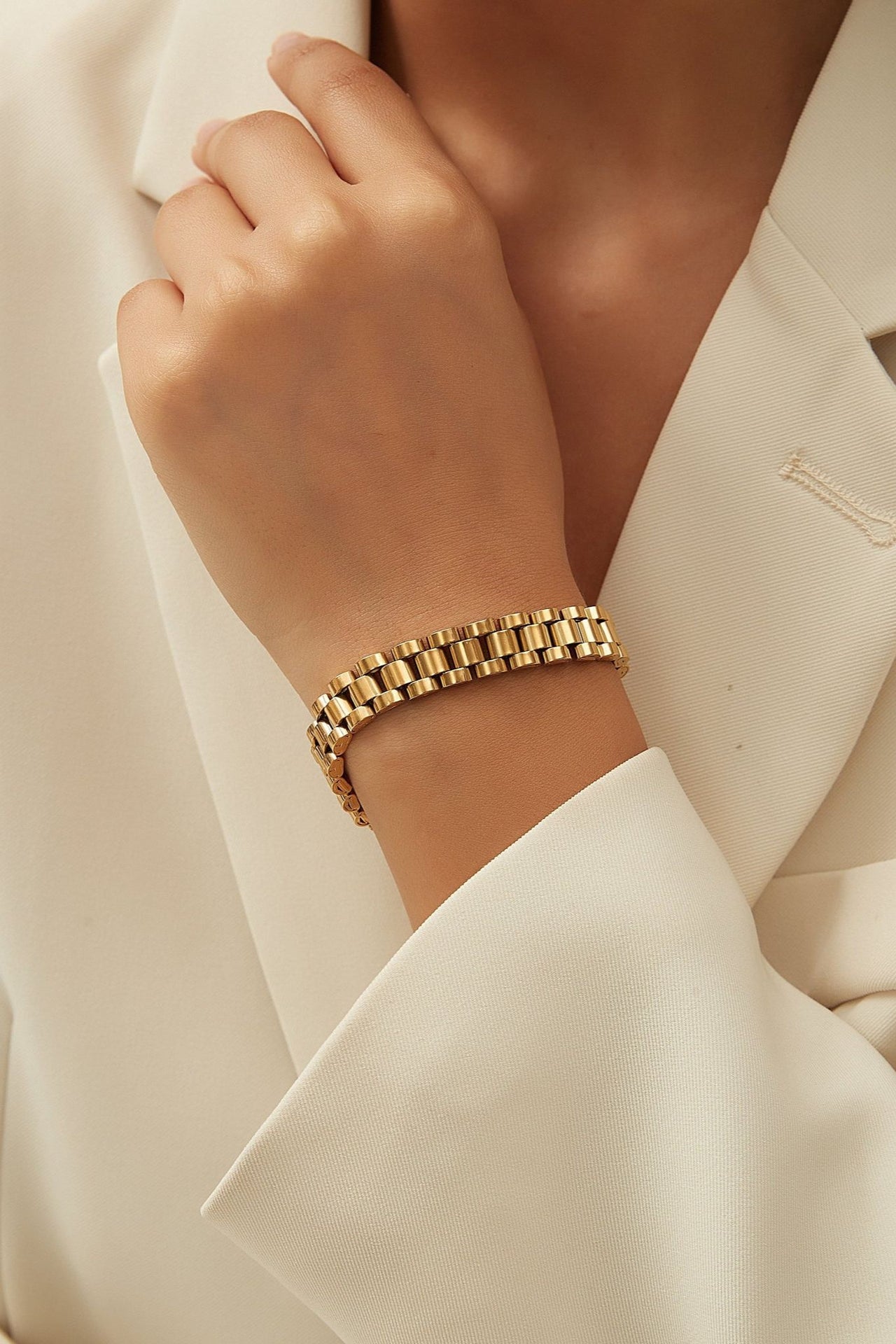 Gold watch link chain bracelet by TEGAN RAE JEWELLERY featuring a sleek, polished design with interconnected watch-style links.
