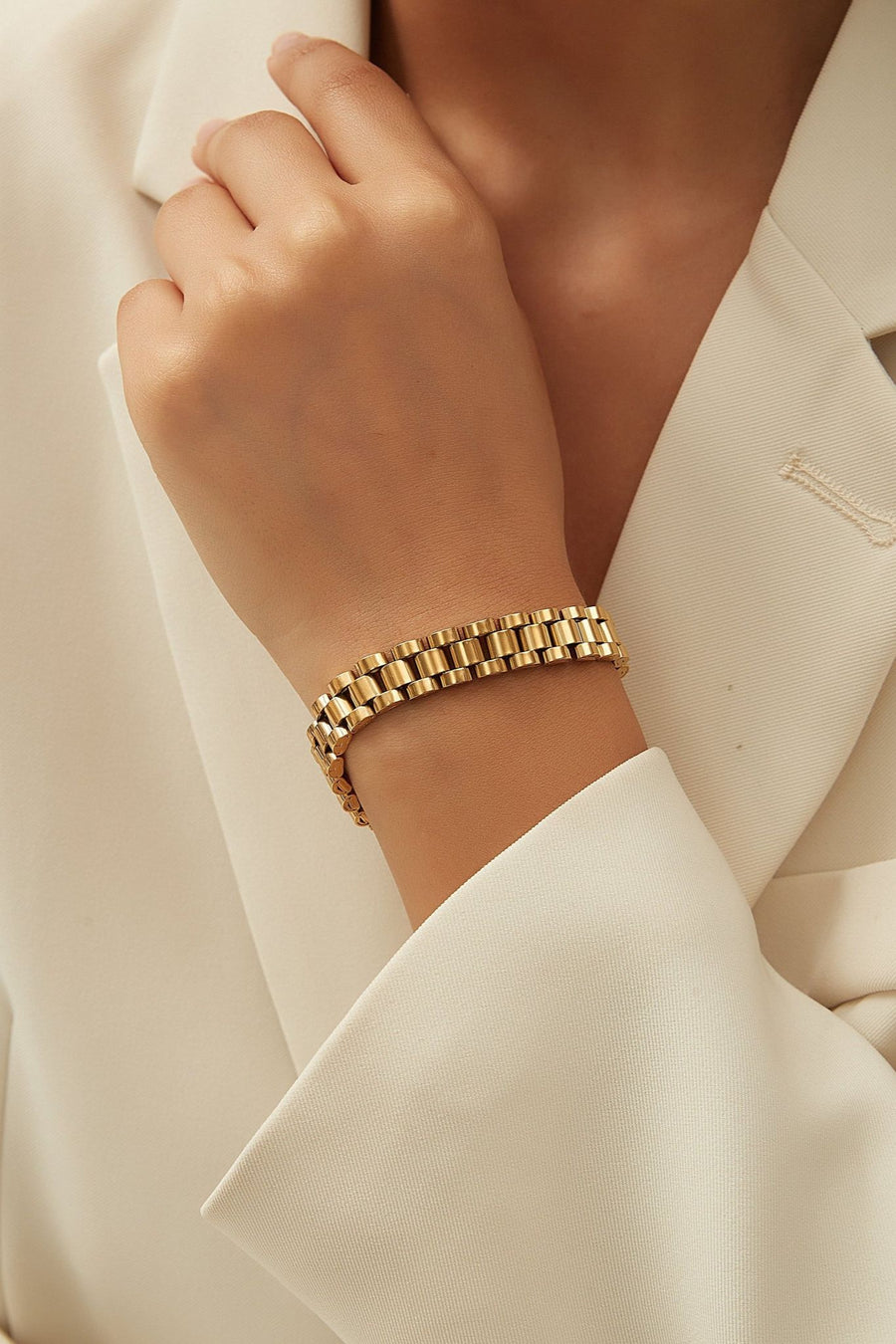 Gold watch link chain bracelet by TEGAN RAE JEWELLERY featuring a sleek, polished design with interconnected watch-style links.