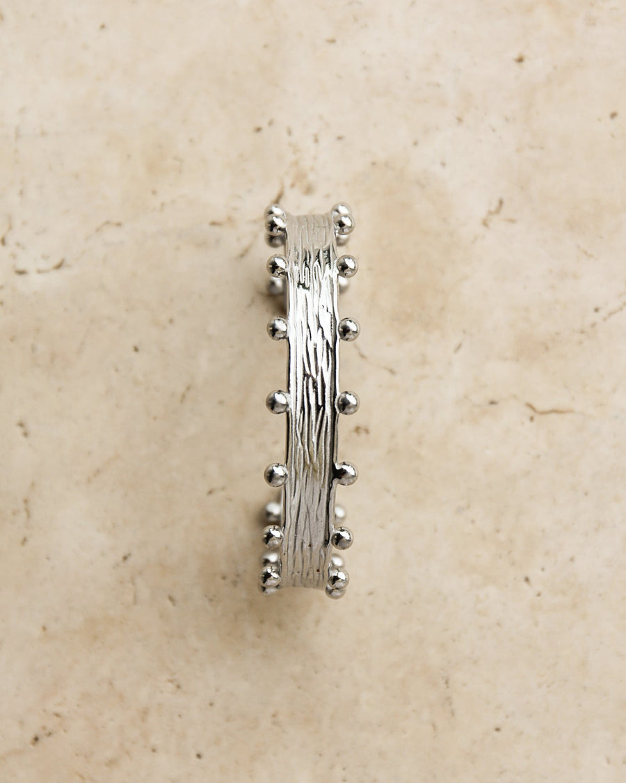 Silver Zeah textured cuff bracelet by TEGAN RAE JEWELLERY, showcasing a sleek, modern design with intricate textured detailing.