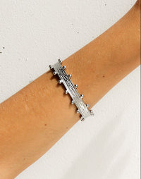 Thumbnail for Silver Zeah textured cuff bracelet by Tegan Rae Jewelry, close-up of the stylish, handcrafted accessory with intricate design.