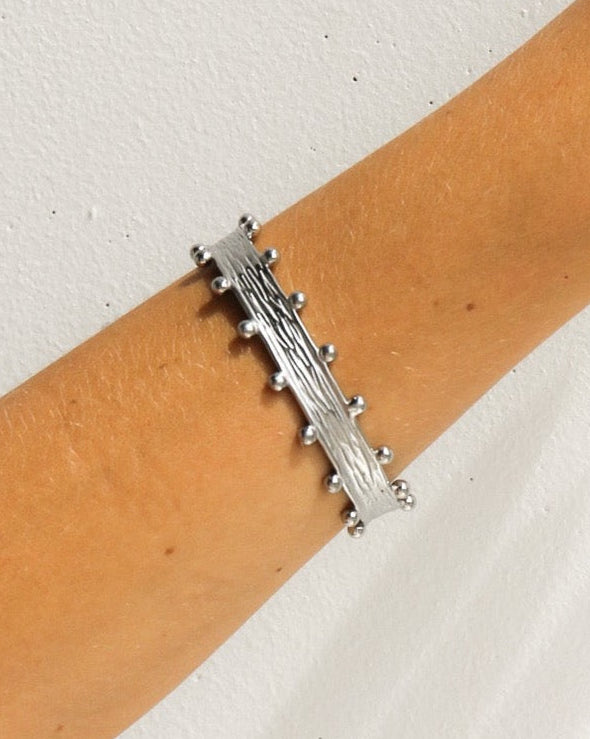 Silver Zeah textured cuff bracelet by Tegan Rae Jewelry, featuring a stylish, handcrafted design with a textured finish.
