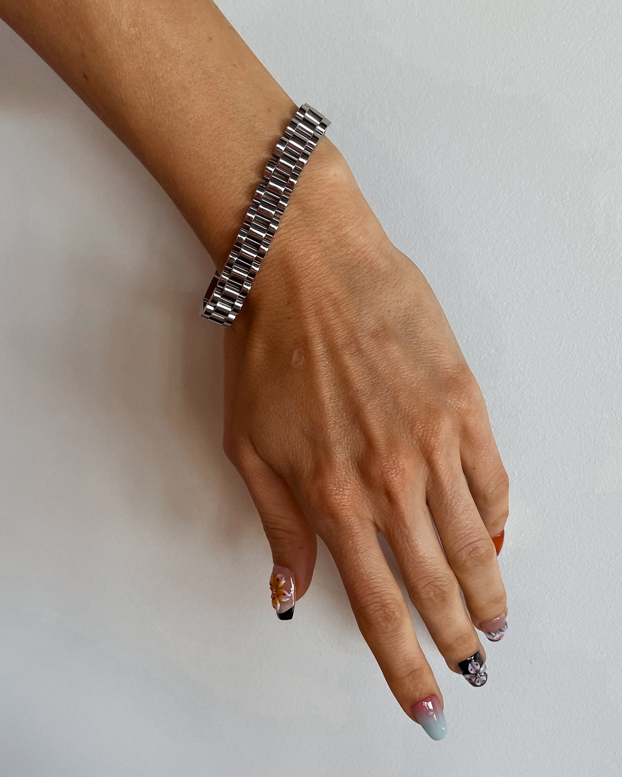 Silver watch link chain bracelet by TEGAN RAE JEWELLERY featuring a sleek, polished design with interconnected links.