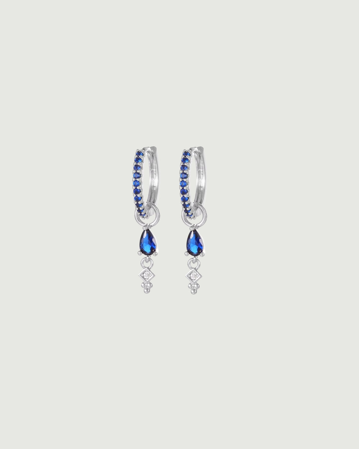 AMILIA HUGGIES DROP EARRINGS BLUE SAPPHIRE SILVER - STUDIO JO STORE  
