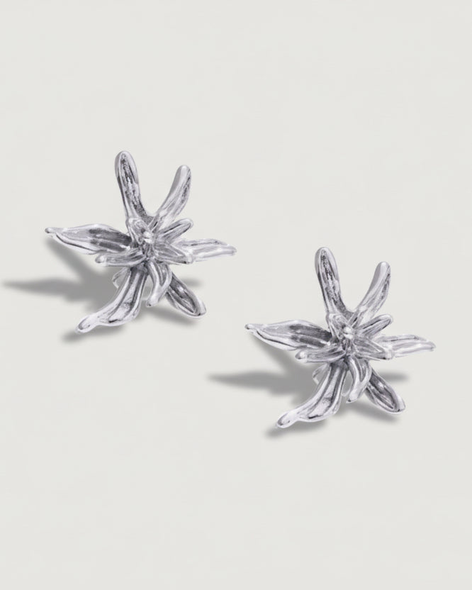 Flower Burst Earrings in platinum silver by Tegan Rae Jewellery, showcasing intricate floral design and elegant craftsmanship.