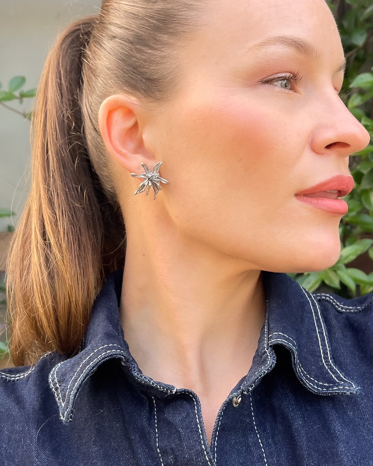Flower Burst earrings by Tegan Rae Jewellery in platinum silver with intricate floral design and elegant craftsmanship.