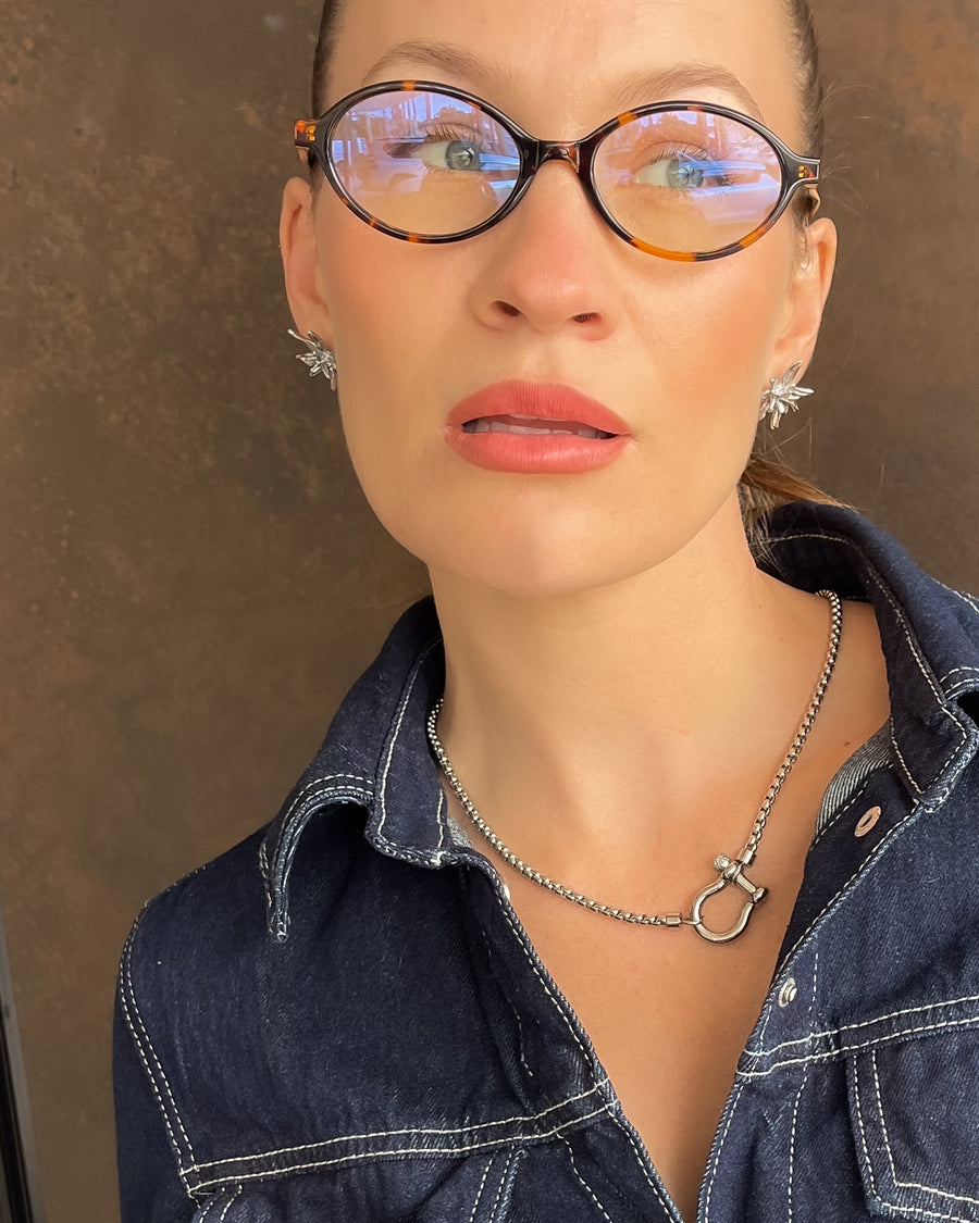 Flower Burst earrings by Tegan Rae Jewellery in platinum silver featuring intricate floral design and elegant craftsmanship.