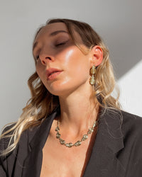 Thumbnail for Gold spiral drop stud earrings by Tegan Rae Jewellery featuring elegant golden design and sleek stud style.