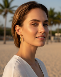 Thumbnail for Woman on a beach with palm trees in the background