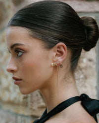 Thumbnail for Tegan Rae Jewellery Lune Grande Bow Drop Earrings in 18k gold featuring elegant bow design and dangling earring style.