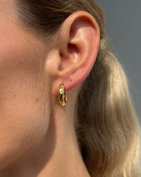Thumbnail for Organic hammered gold statement hoops earrings by Tegan Rae Jewellery, 19mm diameter with 18k gold PVD finish.