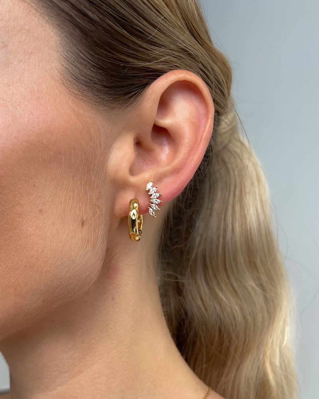 Organic hammered gold statement hoops earrings, 19mm diameter, 18k gold PVD finish by Tegan Rae Jewelry
