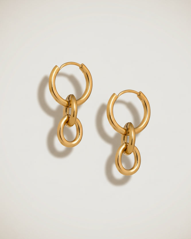 Tegan Rae Jewellery Peita hoop chain earrings in 18k gold, featuring sleek hoop design with chain detail for a stylish look.