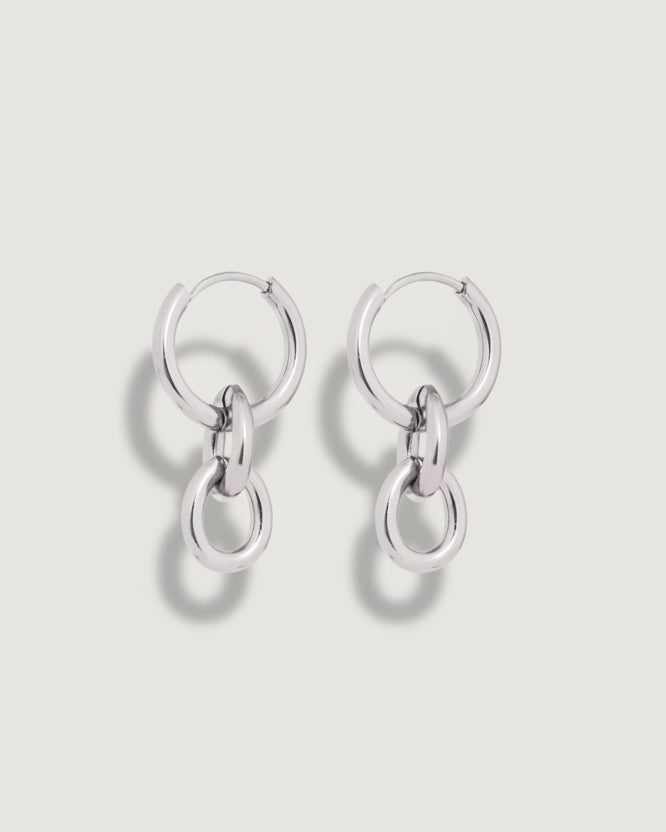 Tegan Rae Jewellery Peita Hoop Chain Earrings in platinum silver, showcasing sleek hoop design with chain detail.