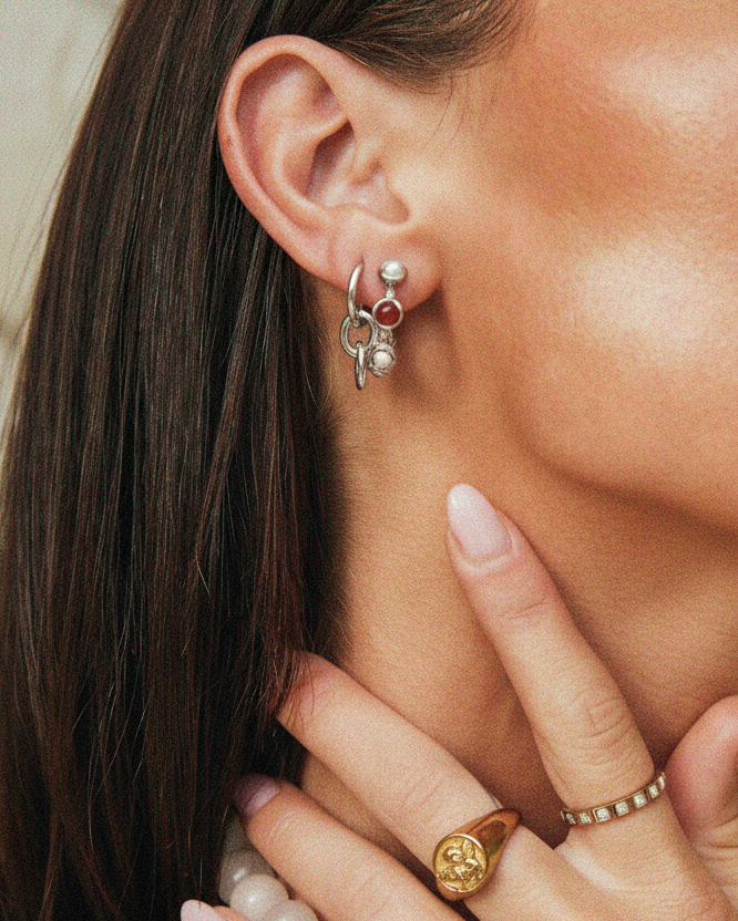 Tegan Rae Jewellery Peita hoop chain earrings in platinum silver, showcasing sleek, modern earring design with chain detail.