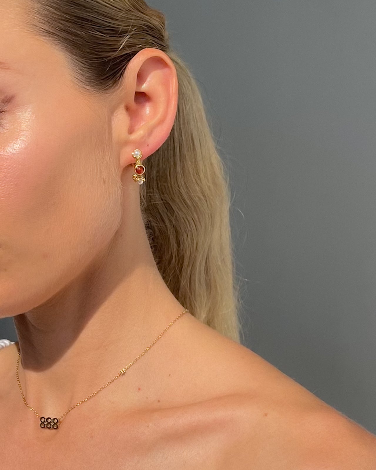 Textured pearl and stone stud hoop earrings by Tegan Rae Jewelry in 18k gold PVD finish, featuring intricate design and elegant detailing.