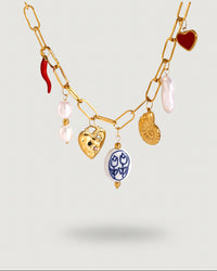 Thumbnail for Tegan Rae Jewellery charm necklace featuring a chilli, shell, porcelain bead, pearl, and heart pendant on a delicate chain.