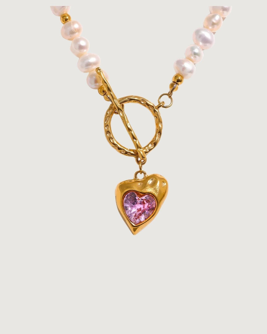 Gold heart necklace with freshwater pearls and pink stones from TEGAN RAE JEWELLERY, elegant jewelry for special occasions.