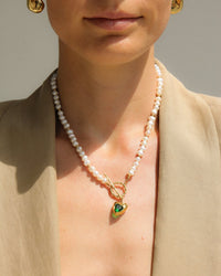 Thumbnail for Gold heart freshwater pearl necklace with emerald green stone by TEGAN RAE JEWELLERY, featuring a delicate pendant and elegant design.