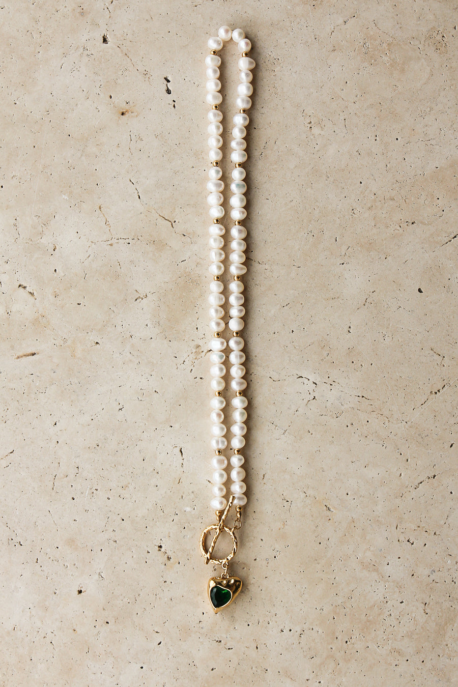 Gold heart freshwater pearl necklace with emerald green stone, elegant jewelry piece by TEGAN RAE JEWELLERY