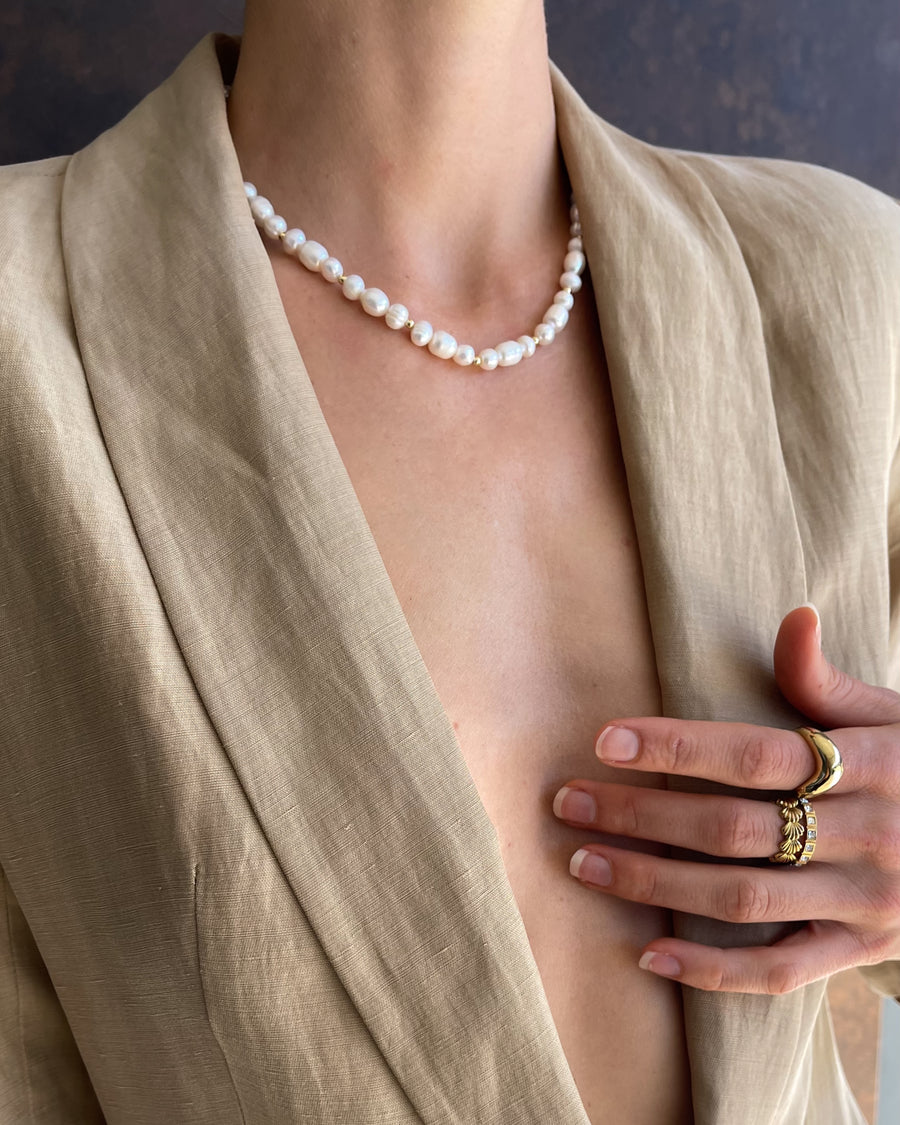Lunaria Frequency Pearl Necklace by TEGAN RAE JEWELLERY, 18k gold with elegant pearl pendant on a delicate chain.