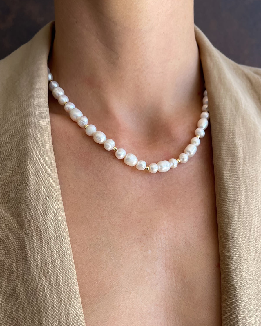 Tegan Rae Jewellery Lunaria Frequency Pearl Necklace in 18k gold featuring elegant white pearls and delicate chain.