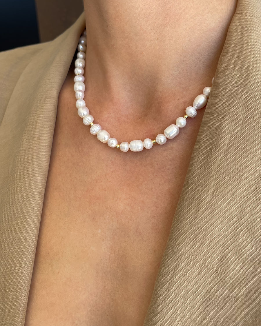 Lunaria Frequency pearl necklace by Tegan Rae Jewellery featuring 18k gold chain and elegant pearl pendant.