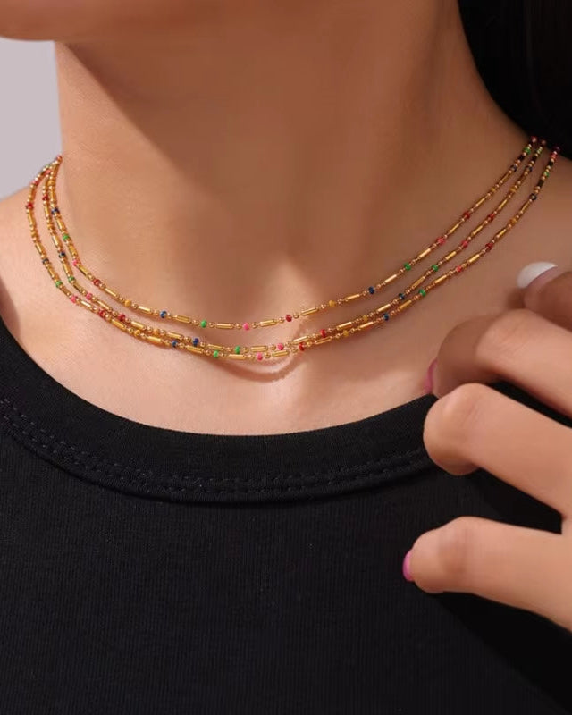 Tegan Rae Jewellery Sol Light beaded necklace with 18k gold PVD finish, featuring colorful beaded design and elegant chain.