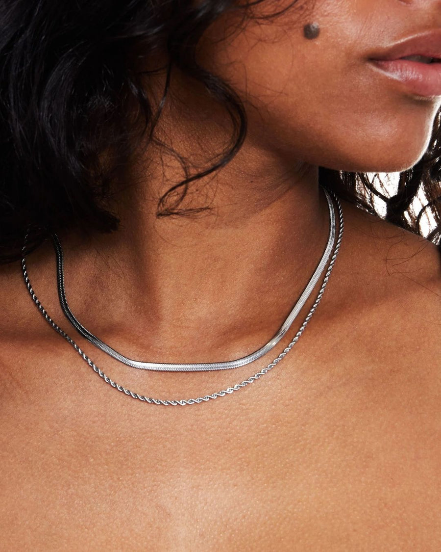 Silver Solace Fine Snake Chain Necklace by TEGAN RAE JEWELLERY, close-up of sleek, delicate chain on a white background.