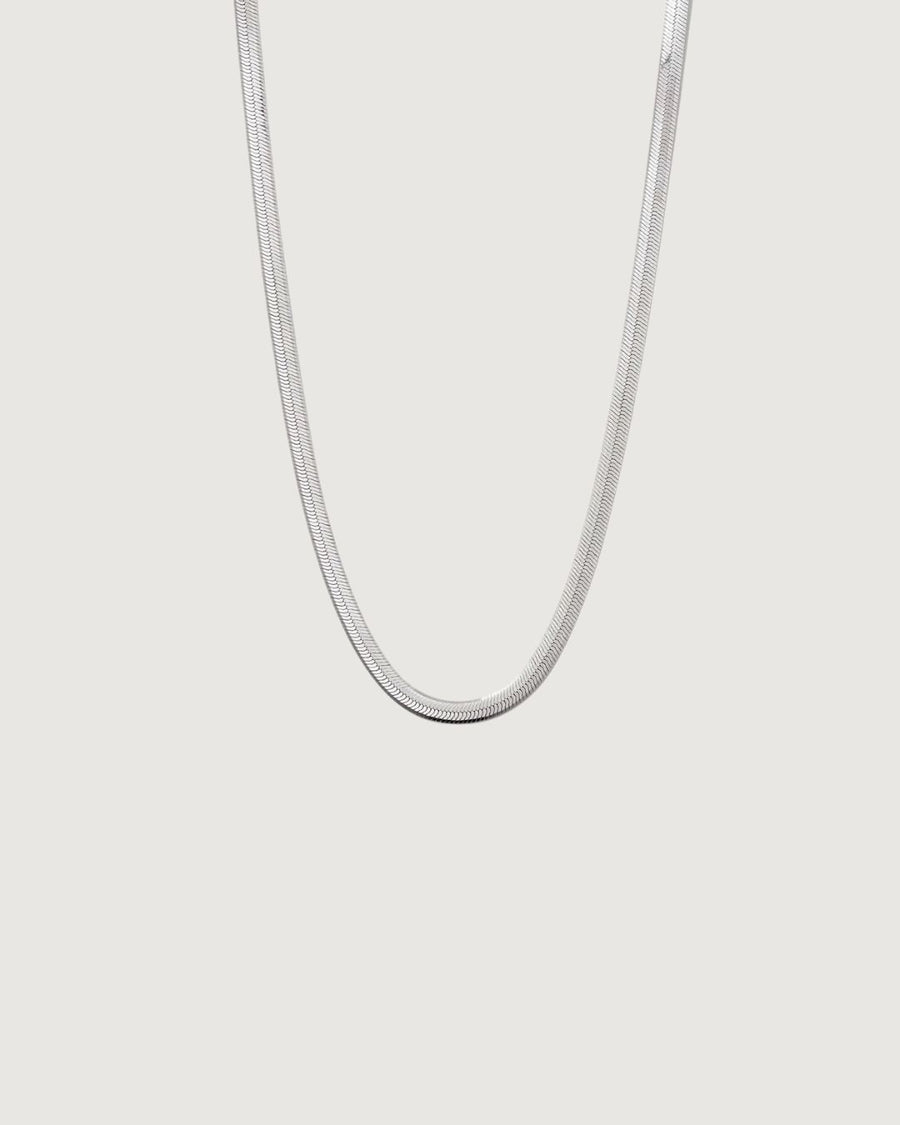 Silver Solace Fine Snake Chain Necklace by TEGAN RAE JEWELLERY, featuring a sleek, delicate snake chain design.