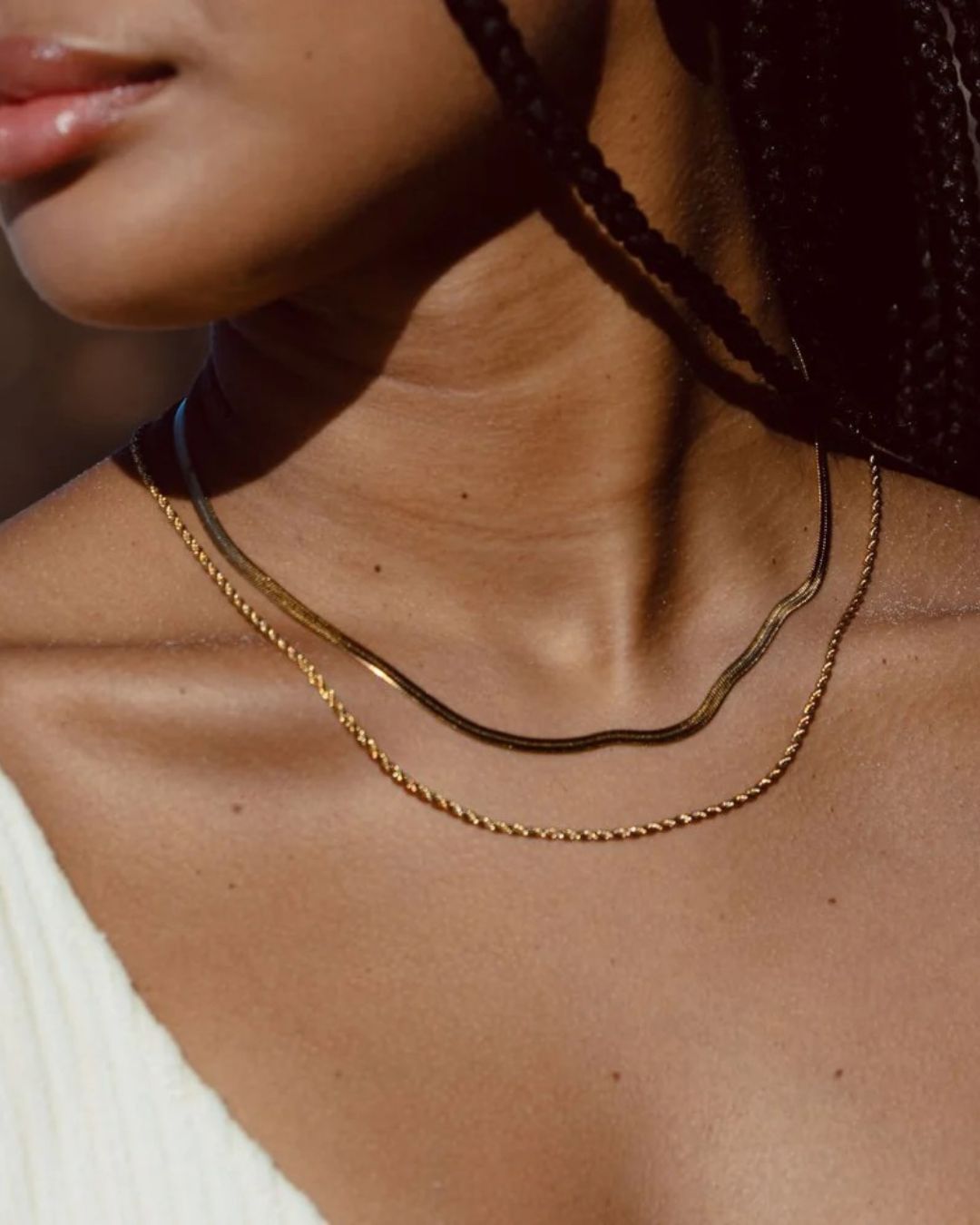 Tegan Rae Jewellery Solace Fine Snake Chain Necklace in 18k gold, close-up of sleek and elegant gold necklace on a white background