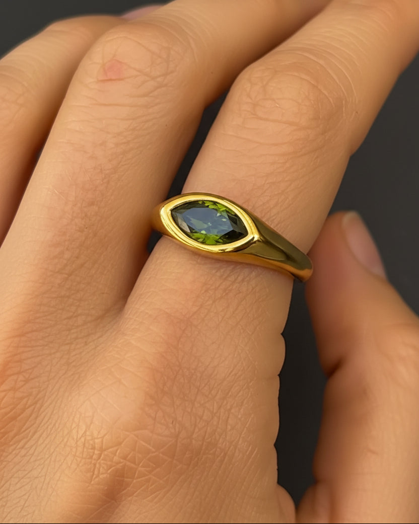 Horse eye signet ring by Tegan Rae Jewellery in emerald green, 18k gold PVD finish, showcasing detailed design and luxurious style.