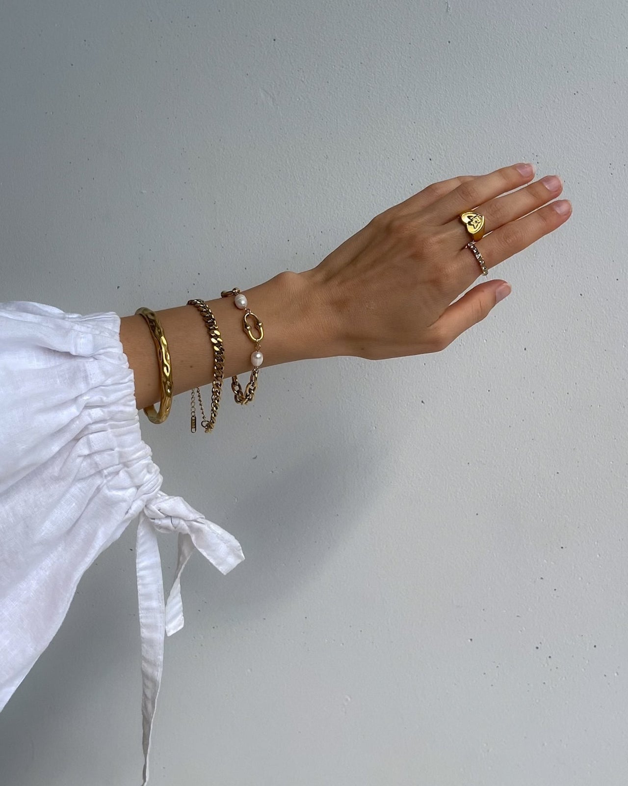 Tegan Rae Jewellery Lumière square cut crystal band ring in 18k gold, showcasing a elegant gold ring with sparkling square crystal.