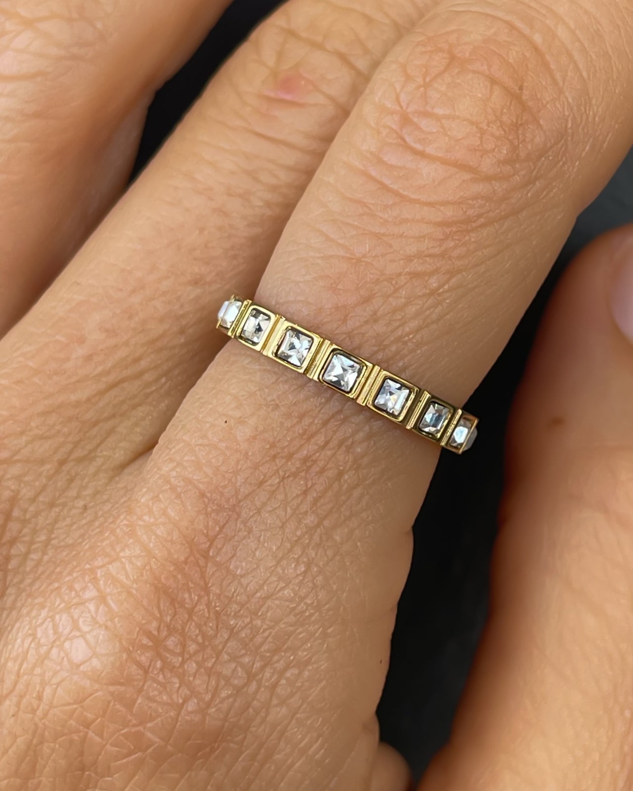 Tegan Rae Jewellery Lumière square cut crystal band ring in 18k gold, featuring a elegant and sparkling design.