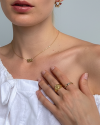 Thumbnail for Tegan Rae Jewellery Lumière square cut crystal band ring in 18k gold, featuring a sleek and elegant design.