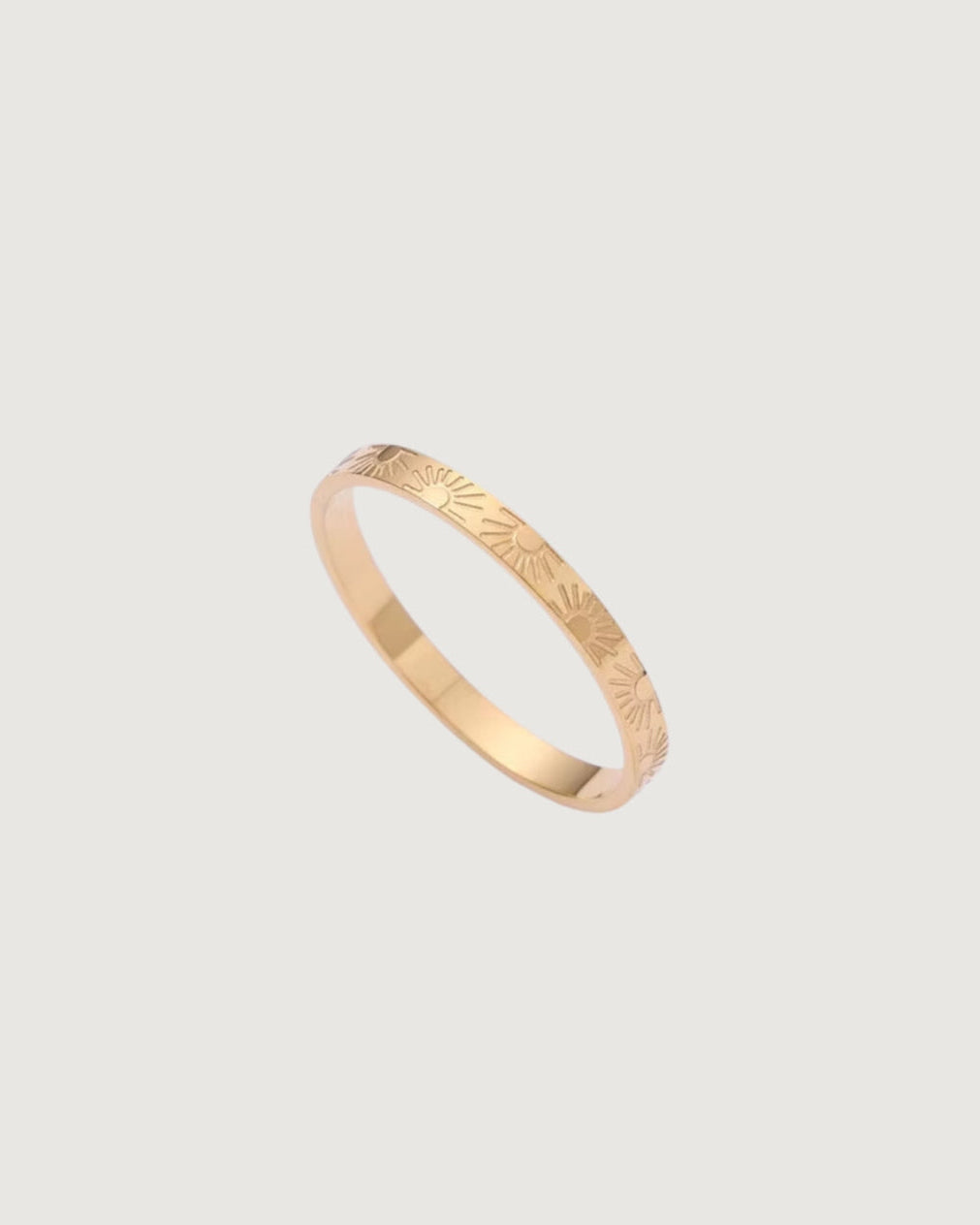 Aura Sun engraved stacking ring by Tegan Rae Jewellery in 18k gold PVD, featuring a detailed sun design on the smooth band.