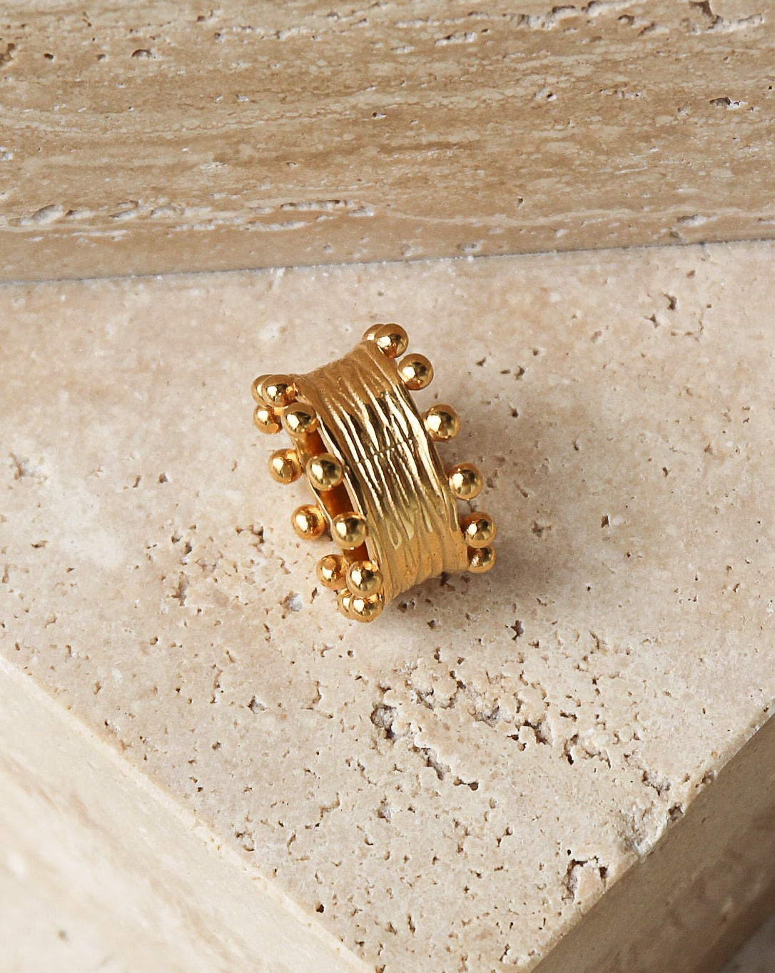 Tegan Rae Jewellery Izaha textured 18k gold PVD ring showcasing a stylish, modern design with a textured finish.
