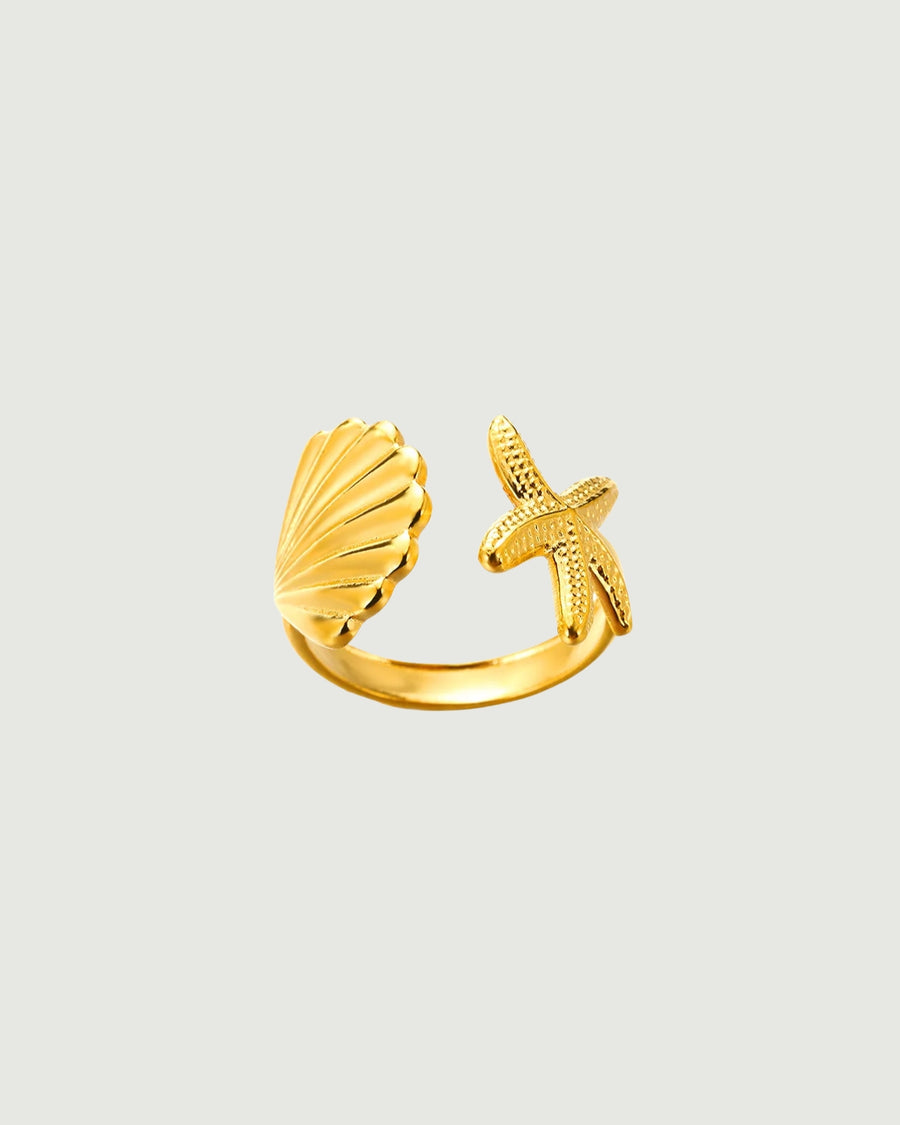 Tegan Rae Jewellery open ring with starfish shell tidal charm in 18k gold PVD, showcasing intricate ocean-inspired design.