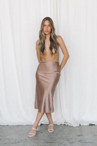 Thumbnail for Model wearing taupe silk slip skirt posing in a studio